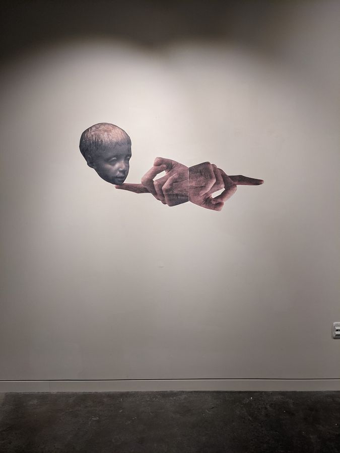 Untitled, collage on wall by Ryan Erickson
